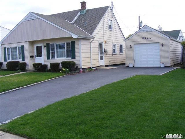 Nice Updated 6 Room Extended Cape-Cod, Ext- Eik, Ext-Lr, Ceramic Bath, 2 Zone Boiler, Abg Oil Tank, Windows, Roof, Det-Garage, Great Neighborhood, C.B., Near All Shopping, Transportation, And Schools, Must See, Buyer To Verify All Information.