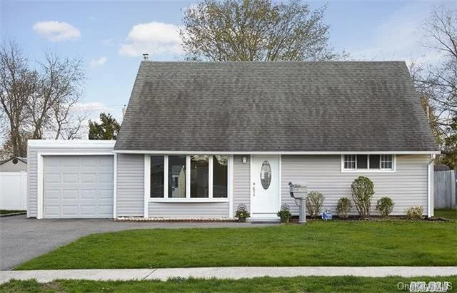 New Kitchen With Grantite Counters And Stainless Steel Appliances, Wood Floors, New Bathroom, New Carpet In Bedrooms.