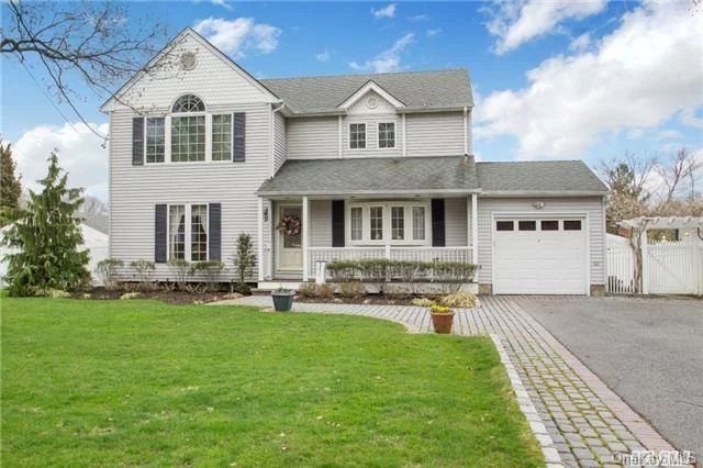 Lovely West Islip Colonial.. Home Features Cherry, Corian Tops, Baths Fully Tiled, Tons Of Closets, Laundry Rm With Outside Entrance, Family Rm W/ Wood Frplc And Vaulted Ceiling. Slider Out To Brick Patio With Water Fountain. Pvc Fencing, Cac, Home Is Situated On 75 X150 Park Like Setting. Taxes W Star 10, 960. Brick Patio & Walkway With Lights Built In. Too Much To List