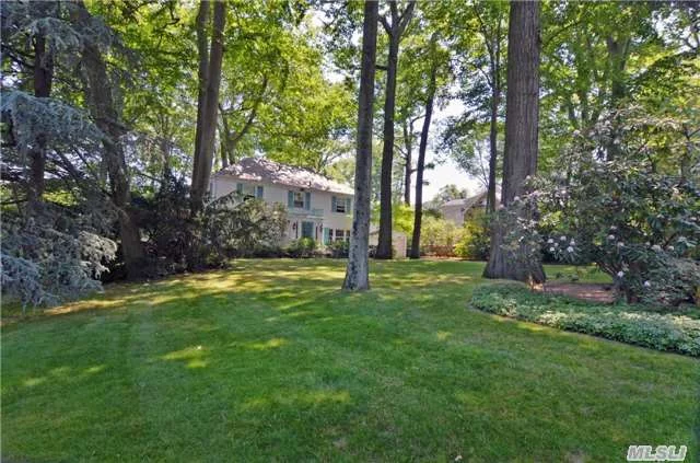 Gorgeous Ch Colonial Set On Quiet St In Prime Flower Hill Neighborhood. Quality Construction Throughout Including Plaster Walls. Hardwood Floors, Updated Kitchen & Baths, Large Mbr Suite, Slate Roof, Cac, Alarm System. Magnificent Almost 1/2 Acre Gound With Slate Patio And Screened Porch. Blue Ribbon Munsey Park School.