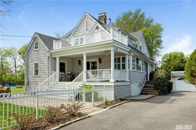 Restored Classic 1886 Colonial Set On Shy 3/4 Acre Manicured Fenced In Yard. The Quality & Character Have Been Maintained Throughout This 5 Br, 2 Bth Which Boasts Hardwood Floors, Cathedral Ceilings, 2 Enclosed Porches, Great Room W/Fpl, Granite Eik, Large Rooms, Det 2 Car Garage. Must See!