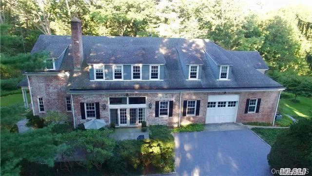 Former Brick Carriage House Built In Early 1900S And Tucked Away On A Lovely 3 Acre Lot Off A Private Drive. Converted To Its Present Layout In The 1980S It Is A Perfect Blend Of Original Detailing And Updated Amenities. 2 Fireplaces And Original Tin Ceilings In Dining Room And Kitchen Add To The Charm. There Is An Attached 4 Car Heated Garage With 12 Ft. Ceilings.