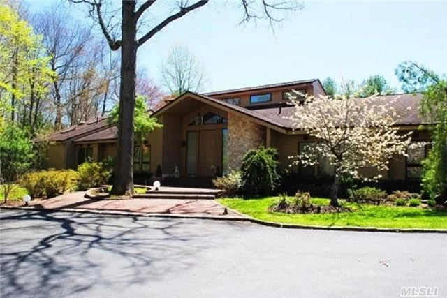 Private Post Modern/Ranch In Gated Community, 3+ Sprawling Acres, Nestled At The End Of A Cul-De-Sac In The Prestigious Town Of Old Westbury. Marble Entry Foyer, Lr And Fam Rm W/Double Sided F Pl, Vaulted Ceilings Thru-Out, Hw Flrs. Mstr Ste W/Loft, Oversized Closets, Mstr Bth W/Jacuzzi Tub, Maids Qtrs, Gym With Sauna And Steam Shower, Gunite Pool, Park Like Yard.