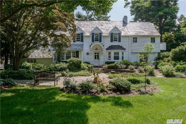 Exceptional Brick Center Hall Colonial Melds Classic Architecture With Today&rsquo;s Lifestyle. It Features A Kitchen/Great Room With Fireplace, Family Room W/Walls Of French Doors And A 2 Room Master Suite W/Balcony Overlooking Exquisite 1+Private Acre With Pool And Pool House.