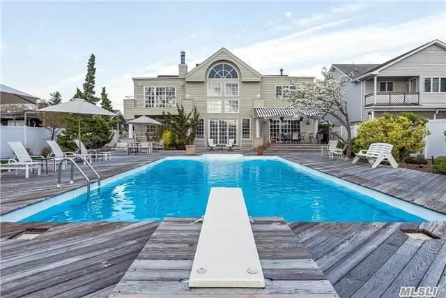 This Is A One Of A Kind Custom Built 6 Bedrm 4.5 Ba 5000 Sq/Ft Contemporary Colonial Waterfront Hme. Situated On A Huge Estate Like Grounds In The Quiet Enclave Of Lido Beach. Boasts 5 Zone Cac, 28 Ft Cathe. Ceilings Central Vac, 2Fpl, Gourmet Kit, Stunning Decks& A Large In-Ground Pool. Proximity To Houses Of Worship, Lirr, Golf, Parkways. Hampton Lifestyle W/O The Commute.