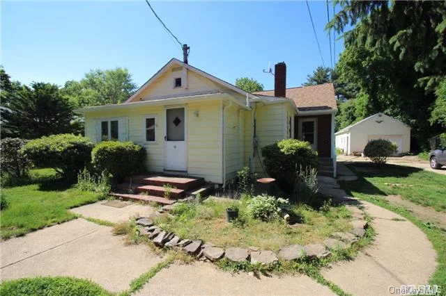 House Is Updated-New Wood Gleaming Floors! New Paint! Large Back Yard 1/2 Acre Flat Grounds-Walking Distance To Lirr-Great For Investment Or Large Family- 2Car Gar Det-Low Taxes- -Close To All Shopping & Highways Too!