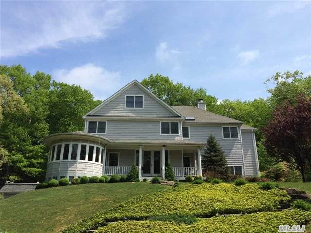 Great Colonial Home With Front Porch And Extensive Decking. Very Bright & Open Layout, 5 Bedrooms, 5.5 Bathrooms, 2 Lofts, Master Bedroom Has A Sitting Room & Marble Bathroom With Jacuzzi Tub, 2 Fireplaces, 5 Car Garage, Cold Spring Harbor Schools, Bordering Nature Preserve.