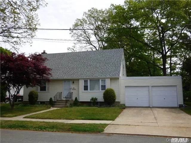 Massapequa Park Cape, Massapequa School District #23, Featuring Newer Roof* New Oil Tank* Burner 2008* New Sewer Pipe To The Street, Oversize Manicured Property, 2 Car Garage, Low Taxes, Close To Shopping And Transportation, Fantastic Potential.