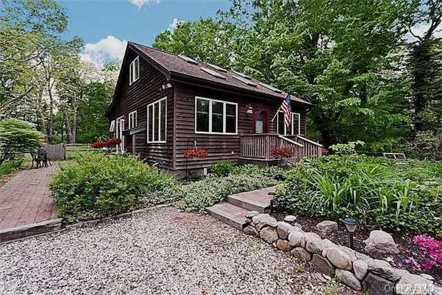 The North Fork Escape Bungalow. Pure Charm & Privacy, Deeded Beach, Cac, Fireplace, Natural Gas Heating, Vaulted Ceilings With Exposed Rafters, Wood Floors, Updated Spacious Country Kitchen, Separate Dining & Fanciful Tiled Bath. 2nd Floor Suite Of 2 Rooms Could Make For Additional Br Or 2nd Bath. Sweet Petite!