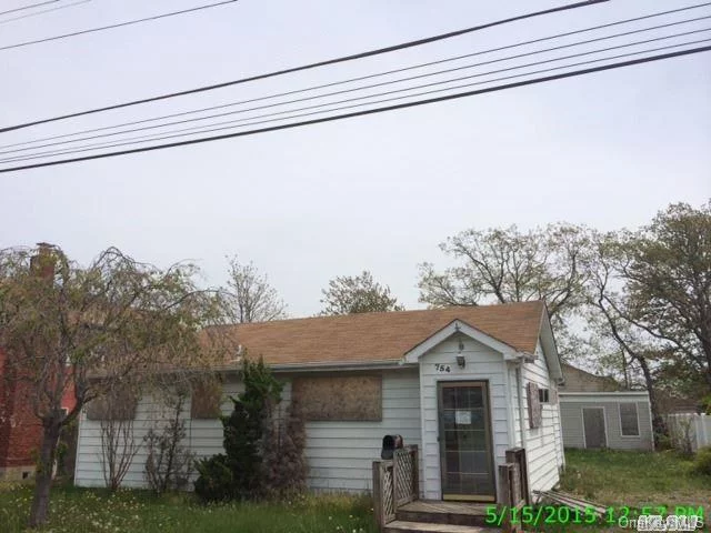 Bank Owned, Sold As-Is With No Reps/Warrs, All Info Must Be Verified, 2 Bedroom Ranch Style Located On Quiet Residential Street. Sits On Large Level Lot With Rear Storage Shed. Needs Remediation And Rehabbing, Great Opportunity, Call For Details.