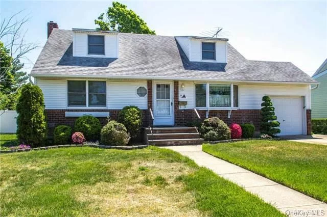 Great 4 Bedroom, 2 Bath Cape, Updated Roof, Windows(Thermapane) Hw Heater, Hw Floors On 1st Floor, Lr And Dr Have Bay Windows, Vinyl Siding W/Brick Front. Covered Patio...Fenced Yard. Basement 3/4 Finished, Attached Garage.