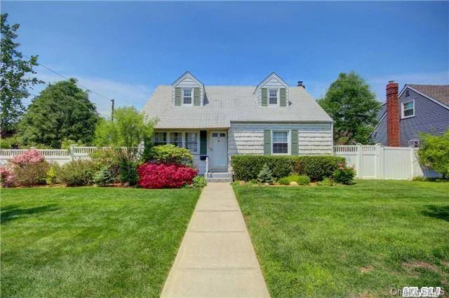 This Lovely Corner Home Has A Freshly Painted Updated Kitchen With Granite Counter Tops, A Skylight That Brightens The Room On A Rainy Day And Yes Gas Cooking.  Most Of The House Has Been Repainted, Updated Windows And New Stair Carpet. The Basement Has An O/S Ent And Game Rm. The Fenced In Large Back Yard Has A Cement Patio With An Extended Overhang For Shade.