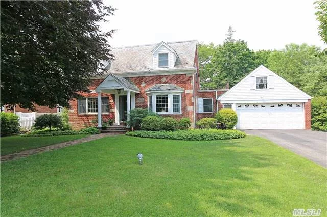 Located In The Prime Cathedral Gardens Area, This 3 Bedroom Brick Charleston Colonial Features A Large Living Room W/Gas Fireplace And Double French Doors Leading To Large Backyard/Patio, Formal Dining Room, Eat In Kitchen, And Family Room With Sliders To Deck. There Is A Finished Basement, Central Ac/Heat, Multi-Zone In Ground Sprinklers, And Updated Anderson Windows.