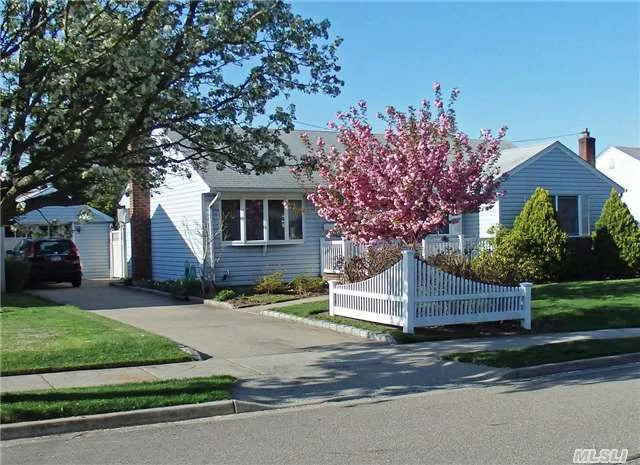 Lovely Mid Block, Wide Line, Exp&rsquo;d Ranch. Enjoy Nice Days On The Pretty Front Porch Or The Enclosed Fla Room. Boasts Open Floor Plan With Updated Granite Eik, Wood Floors, Vinyl Siding, Anderson Windows, Fenced In Yard, Basement With Ose. Arch Roof. 200 Amp. Has All C/O&rsquo;s! Gas Is In The Street For Easy Conversion. Must See And Start Packing!