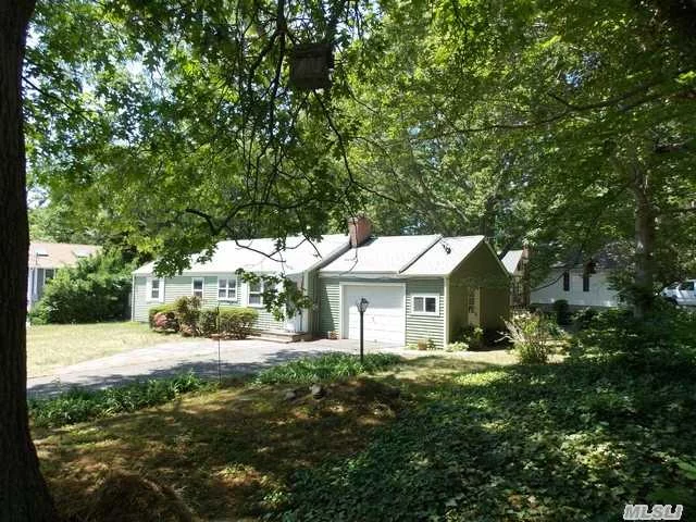 Reeves Park Location! Cozy Home With Some Wood Flooring, Stone Fireplace, Newer Windows, Nice Size Bedrooms, Full Basement With Inside And Outside Access, Fenced Yard And Just Minutes From The Sound. Great For A Summer Escape Or Year Round Living. Minutes To Beach. Taxes Can Be Grieved! 2% Peconic Tax Applies.