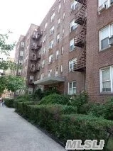 Large Studio Co-Op In The Heart Of Flushing, Kitchen With Large Windows, 3 Big Closets, Convenient To Shops/Supermarkets/Buses/Subway #7 Train.