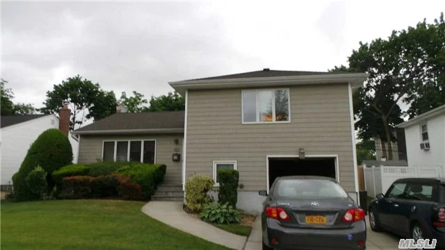 What A Beauty. Just Move In To This Lovely Split Level With Updated Spacious Rooms & Lovely Backyard
