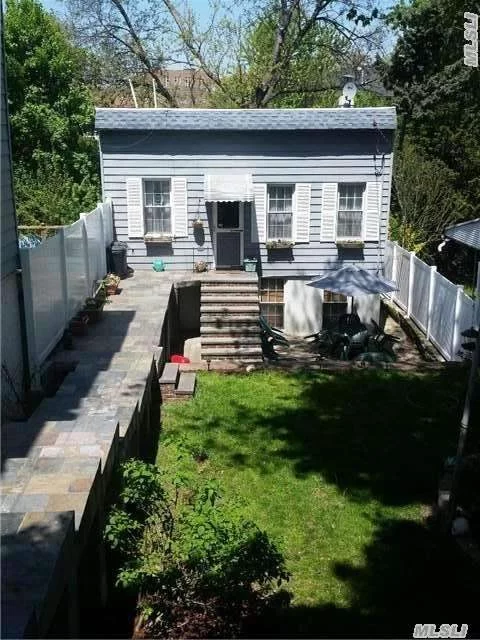 Located On The Ridgewood Border This Sweet 2 Bedroom Cottage Features Wood Floors, Metal Ceilings, Walk In With Family Room, Yard And Located Near All.