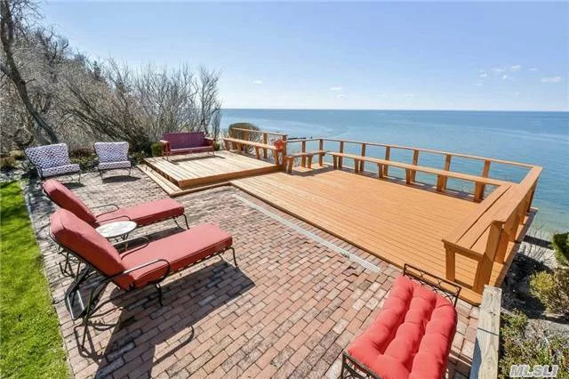 Along A Country Lane, Nestled Above A Wide Sandy Beach, This One Of A Kind Home Offers Sweeping Water And Coastal Views And Spectacular Sunsets With Steps To A Sound Beach And 79 Feet Of Long Island Sound Frontage. With Privacy And Beautiful Architectural Accents, This Home Provides Sophistication In A Magnificent Natural Setting