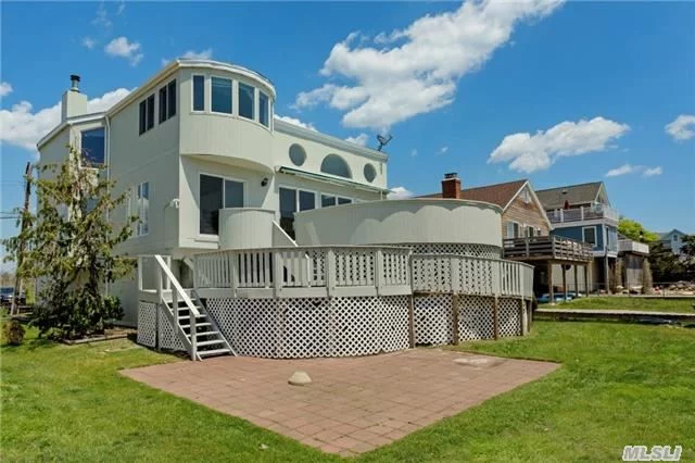 Custom 2 + Story, 3000 Sqft 4 Seasons Beach Home With 3/4 Bedrooms, 3 Full Baths, Spectacular Inlet And Bay Water Views, Great Open Floor Plan, Large Rooms, 2 Master Suites. Unique Design. Live A Wonderful Lifestyle Just 60 Minutes From Manhattan!!