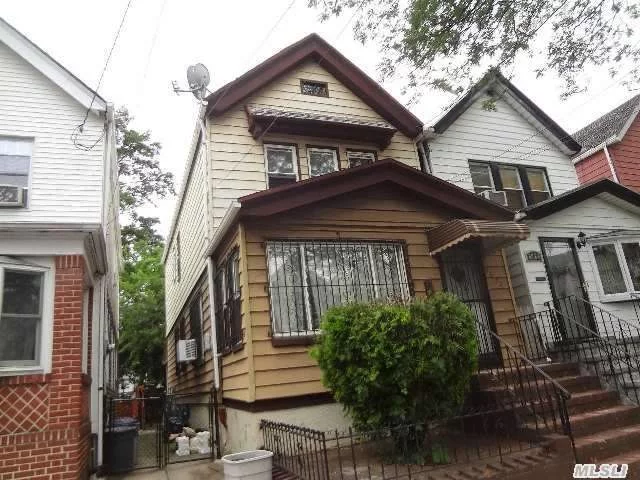 Detached 1 Family 7 Rooms, 4 Bedrooms, Kit, L/R, Dr, Full Basement, Private Rear Yard. Wood Floors.Near Shops And Schools. Close To 75th St Train.