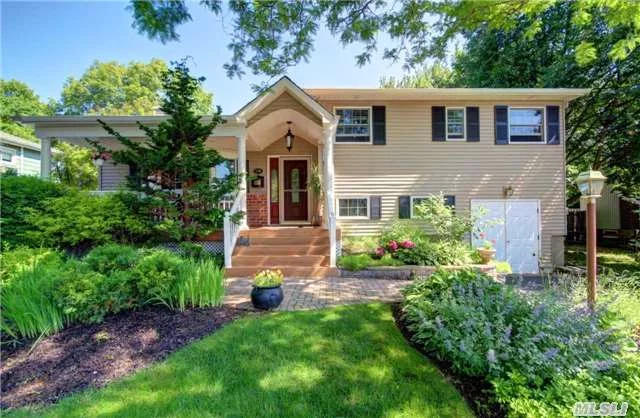 Warm & Inviting Beautiful Home With Front Porch. Lr W/Fpl. Extended Eik W/ Breakfast Nook & Bay Window W/ Sliders Leading To Deck. Quiet, Beautifully Landscaped Yard. Master Has A Full Bath. Main Bath Is 6 Months Young. Expanded Family Rm. W/1/2 Bath. Lots Of Over Sized Windows And Special Touches . Roof Is 10Yrs. & Is 1st Layer.