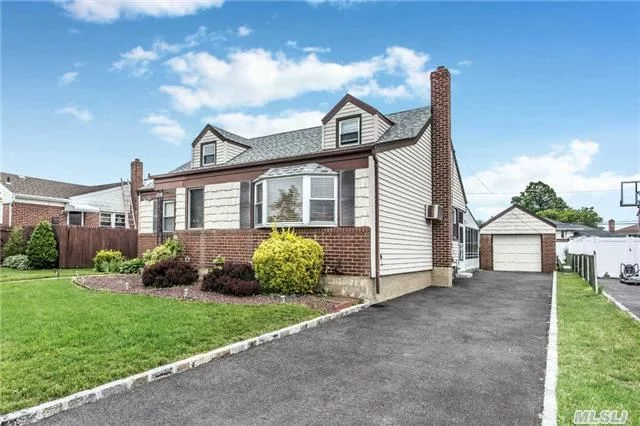 4 Bedroom 2 Bath Cape In Bethpage. Needs Tlc Large Property 60X117 Eik, Formal Dinrm, Livrm, 2 Full Bth, Hardwood Flrs Throughout, Gas Heat, Finished Bsmnt, Updated Heating System, Roof Elec, And Driveway. All Offers Will Be Countered.