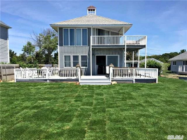 Opportunity Knocks At This Bayfront Cottage On Peconic Bay With Spectacular Views. Be In This Summer And Enjoy The Beachy Lifestyle That This Quaint Community Affords. Updated Kitchen, 4 Bedrooms, 3 Baths, New Bulkhead And Landscaping. Plenty Of Waterfront Decking To Dine Al Fresco Or Just Soak Up The Sun. Won&rsquo;t Last.