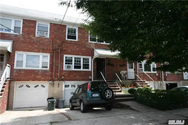 Brick Attached Two Family Home. Five Rooms Over Five Rooms And A Fully Finished Basement. Private Driveway And A One Car Garage. New Windows. Tankless Hot Water Heater. Gas Heat. Neat & Clean.