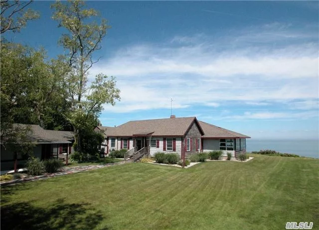 This Handsome Cedar Shingle Cottage Has Extraordinary Sunset Waterviews Across Long Island Sound.