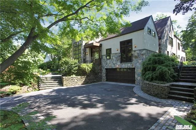 Magnificent Masterpiece Of Stone, Wood And Stucco Blends With Landscaped Woodland Setting Designed For Privacy.Architectural Details And Generously Proportioned Formal Rooms, With Divine Finishes. Custom Kitchen Compared To None! Magnificent Main Floor Master Suite, Ralph Lauren Style Library/Private Onyx Bathroom, Den/Custom Built-Ins, Generator, Too Much To Describe!