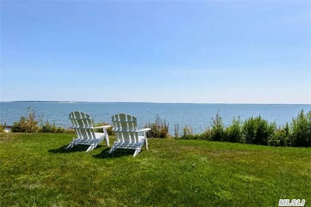 Set Down A Long Winding Driveway, This Great Waterfront North Fork Home With175Ft. Of Bulkhead Has Magnificent Views Overlooking Peconic Bay. This 6 Bedroom 3.5 Bth Charming Waterfront Home Boasts Sun Drenched Rooms Thru Out. Includes A Separate One Bedroom Summer Cottage W. Full Bath, Fishing Shed & Gazebo. Relax, Sun Or Sail In This Tranquil Setting On 1 Private Acre