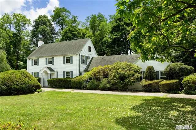 Classic Center Hall Colonial Set On One Shy Acre Of Lush Landscaped Property. Great Location. Cir Driveway. Attached Private Office Suite W/Bath & Sep Entrance. All Hardwood Flooring Throughout, Large Eik W/Ss App & Center Island, 25X50 In Ground Pool With Decking. Huge 3.5 Detached Garage, Gas Heat & Cooking. 24 Hrs Notice To Show