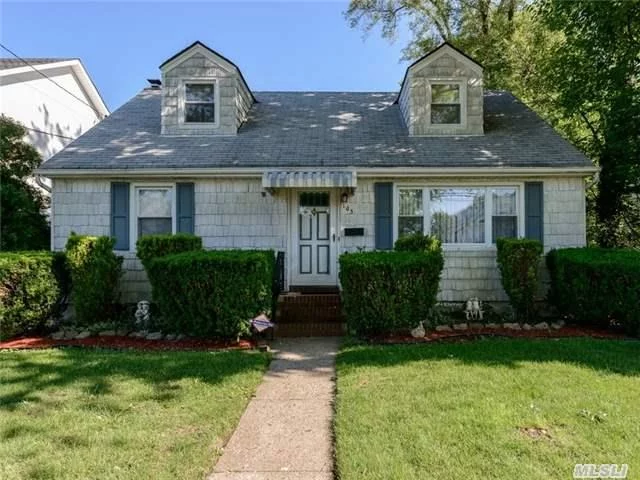 Updated And Wonderfully Maintained Home In Mid Block Location With Beautiful Property. New Windows, Hardwood Floors On 1st Floor, Central Air, Redone Baths, Alarm System And More Make This A Home Not To Be Missed. Taxes Are Being Grieved.