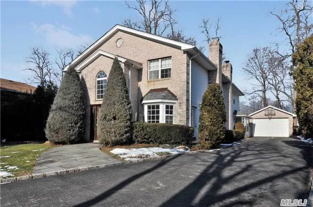 Spacious 7 Bedroom, 3.5 Bath Colonial On Beautiful Tree Lined Street. Over 3500 Square Ft Of Living Space, Lr W/Wood Burning Fireplace, Large Formal Dr, Master Suite, Bright Airy Eik, 2 Bedrooms On The Main Fl, Updated Baths, Brick Patio, 2 Car Garage On Over 1/2 Acre. Near Shopping & Schools. Make It Your Own! Taxes Being Grieved.