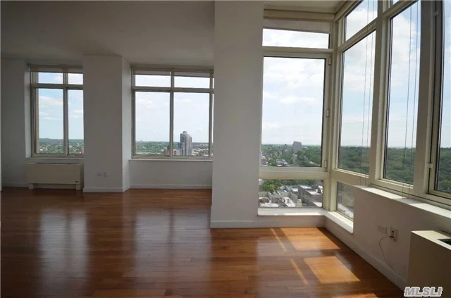 Jr. 4 Convertible To Two Bedrooms. High Ceilings, Spectacular Views. All Amenities: 24-Hour Doorman, Gym, Parking, Rooftop, Children&rsquo;s Room. Pet Friendly. Steps To Express Subway, Lirr, Austin Street Shopping And Restaurants.