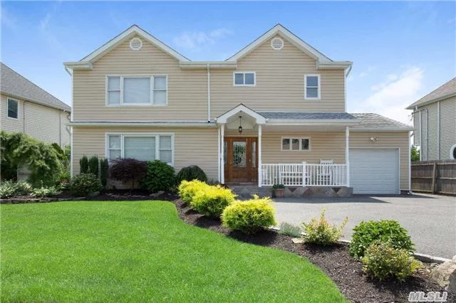 Spectacular Colonial On Professionally Landscaped Property In The Plainview Old Bethpage School District Featuring An Open Floor Plan, Full Finished Basement With Full Bathroom, New Washer/Dryer, New Boiler, Gas Heating And Cooking, Cac, Arlarm System, Igs, And Much More!