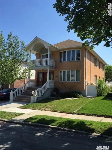 This Beautiful Detached Two Family Home Features All Brick, Vaulted High Ceilings, Hardwood Floors, Central Air, Andersen Windows, Marbleized Balcony With A Fantastic View Of The Near By Alley Pond Park. Conveniently Located Near The Excellent District 26 Schools And All Public Transportation.