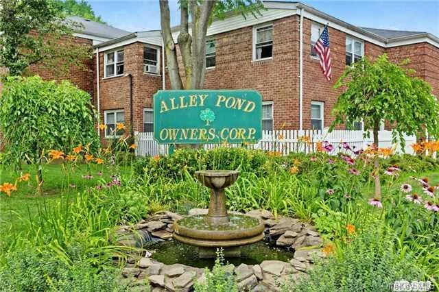 Alley Pond Spacious One Bedroom Lower Apartment Features: Large Living Room, Dining Area, Granite Counter Tops W/Wood Cabinets In Kitchen W/Window, Gleaming Hardwood Floors Throughout, Glass Sliding Shower Doors In Updated Bathroom, Windows And Closets Galore, Ceiling Fans, Two Air Conditioners, Pet-Friendly. Convenient To Transportation, X-Bus, Major-Hwy, Park, Shops Etc.