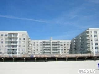 Beautiful, Bright, Spacious 1Br With Terrace In Luxury Bldg. On Boardwalk. Large Br, Kitchen With Gas Cooking, Sunken Lr, Formal Dr. Wood Floors W/Carpeting. Plenty Of Closets, New Windows & Doors. Large Gym, Storage Facilities, Party/Meeting Rm. With Kitchen, Bike Rm., Outdoor Olympic Size Pool. Laundry Room On Every Floor. Security System. Parking Available/Not Included.