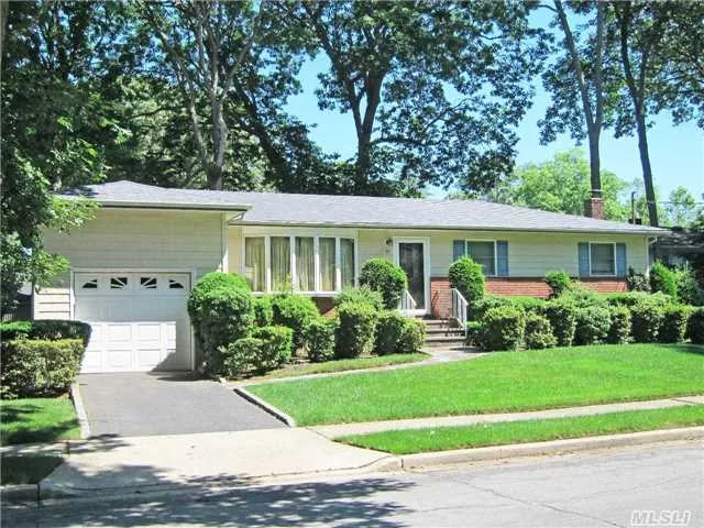 Located Mid-Block On A Quiet Street Lies This 3 Bedroom, 1 Bath Wide-Line Ranch. Plenty Of Living Area With An Open Floor Plan. Plus A Huge Finished Basement. Update And Make It Your Own! In Massapequa Woods, Massapequa School District #23, Updated Bath And Anderson Windows.