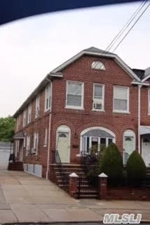 Enjoy This Large Brick Sd, Legal Two Family Located In Bayside! Features Include 7 Bedrooms, 2 Baths, 2 Eat In Kitchen, Formal Dining Room, Casual Living Room, Hardwood Floors, 4 Separate Entrance, Basement, Two Car Detached Garage, And Backyard. Close To Transportation (Lirr And Bus). Quiet Block, Walking Distance To Playground .