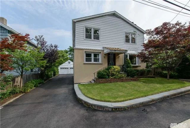 This Bright And Spacious Colonial Is Situated On A Large Private Property With Patio And Offers Living Room With Fireplace, Dining Room, Den, Updated Kitchen And Baths. Second Floor Features Master Bedroom, 3 Additional Bedrooms And Bath. Convenient To Town, Shopping And Lirr.