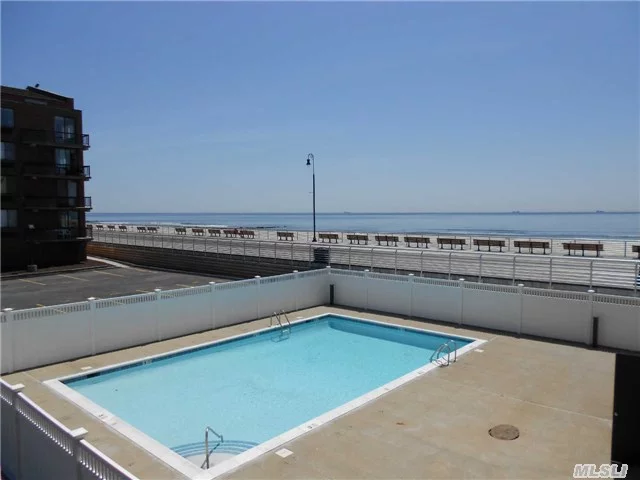 Large Duplex Apartment With An Ocean View Located At The Desirable Ocean Walk Condo. Large Terrace, Fireplace, Assigned Parking, Heated Pool And Gym, There Are 2 Bedrooms And 2.5 Baths. Washer/Dryer In The Unit.