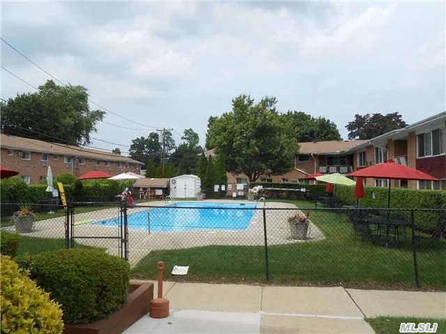 Pretty As A Picture! Best Location And Price In Suburbia On The Much Sought After 1st Floor Corner Unit With View Of Pool. Kitchen And Bath Updated Last 5 Years. Nothing To Do But Hang Your Clothes In This Pristine Unit. Laundryrm, Bikerm, Storage Bbq Area. High Walk Score To Farmingdale Village, Restaurants, Pubs And Lirr. Tax Inc In Maint Incl Heat $695.49 With Star