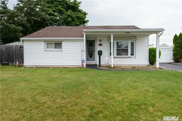 A Wonderful Home Set Mid Block Location- Cute And Comfortable Living Room With Open Floor Plan Into The Eat-In-Kitchen/Hardwood Floors New Full Bath/ Large Property With A Wonderful Piece Of Property To Call Your Own/A Must See !!