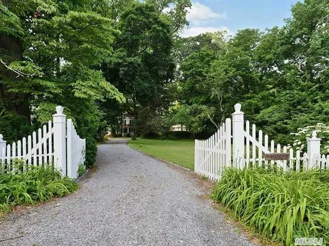 If You&rsquo;re Looking For Property Then This Magnificent 92 X 249 Piece Is For You. Situated In A Quiet Location This Early 1900&rsquo;S Mariner&rsquo;s Home Features A Ground Floor Studio With Loft, 20 Ft Soaring Ceilings That Can Also Be A Master Suite With Full Bath, Living Room, Eat In Kitchen, Formal Dining Room, Dual Level Enclosed Rear Porch, Hardwood Floors Updated Heat & Electric