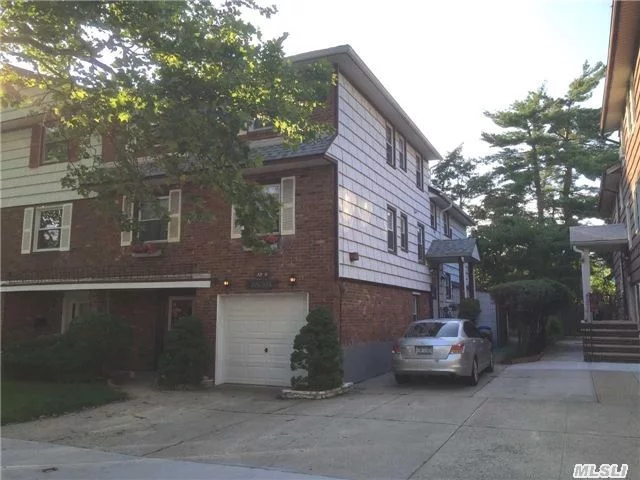 Well Maintained Huge Triplex Apt. With Southern Exposure! . Best School District Of #26, Only 2 Blocks Away From Ps203, Cardozo Hs And Qcc, Zoned For Ms158. Close To Buses Q27, Q30, Qm5, Near Supermarket., Restaurants, Post Office And Shopping. Minutes Away From Major Highways. Sliding Door To Patio, Shared Back Yard With Upstairs Tenant.