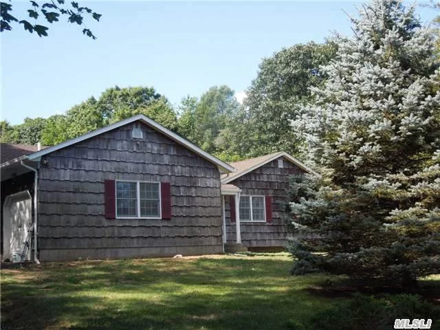 Ultra Private And Secluded Property On 1.03 Acres. New Roof And New Heating System. Hardwood Floors.