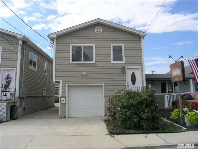 Completely Updated And Sweet! 2 Bedrooms, 1 Bath...Open Floor Plan -kitchen Living Room Combo. Cac, Wood Floors, Washer /Dryer Hook Up. Garage With Extra Storage. Close To Public Beach And Restaurants! Credit Check And References A Must ....No Pets